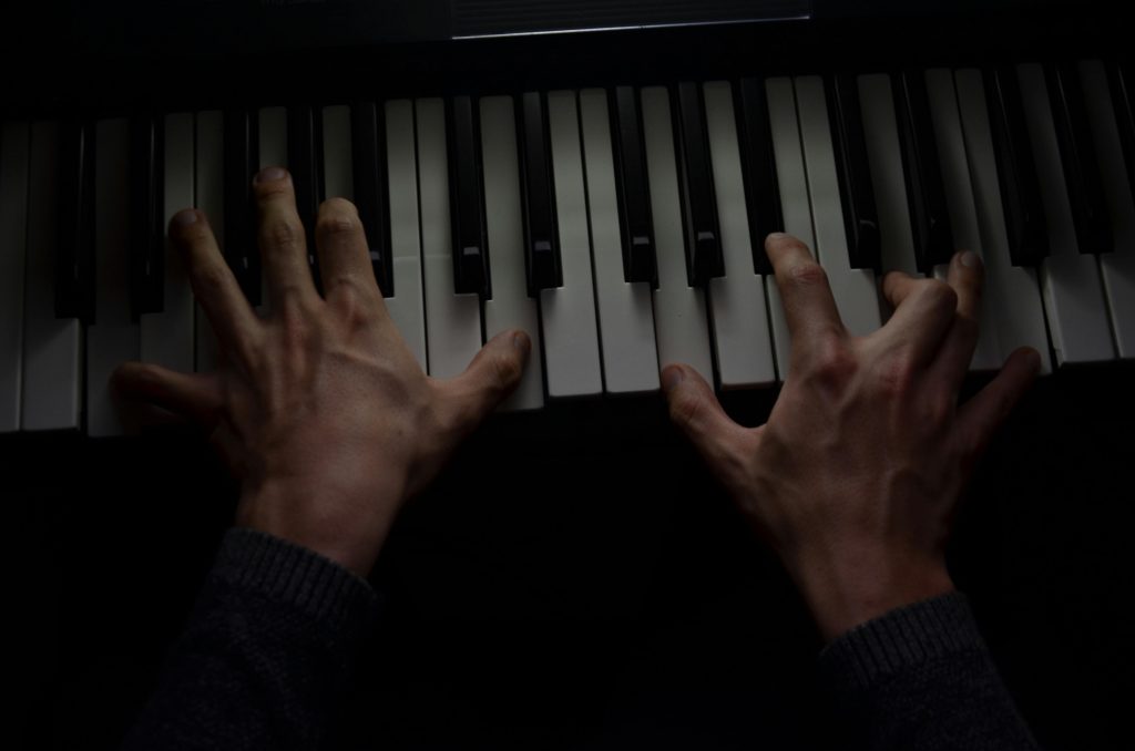 pexels-photo-10667168-10667168 Close-up Shot of a Person Playing Piano